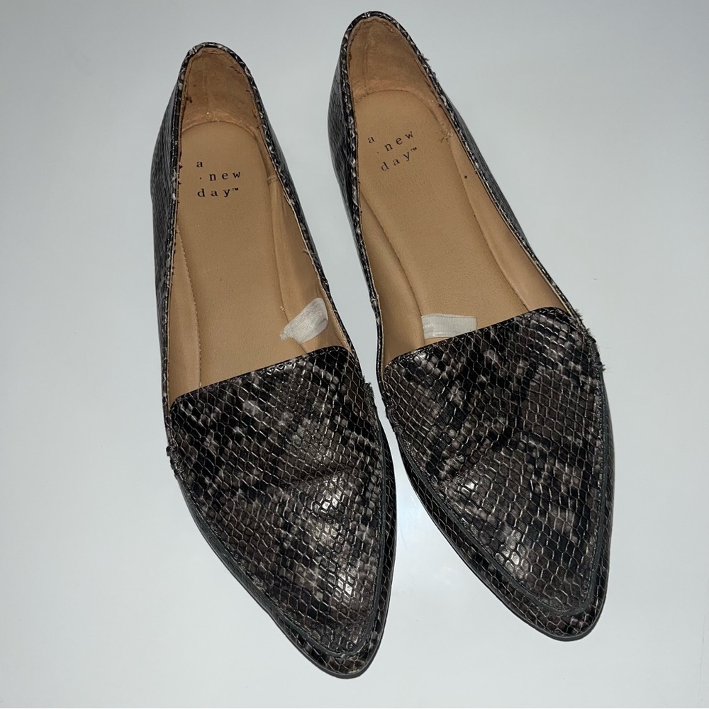 Pair of snake pattern shoes